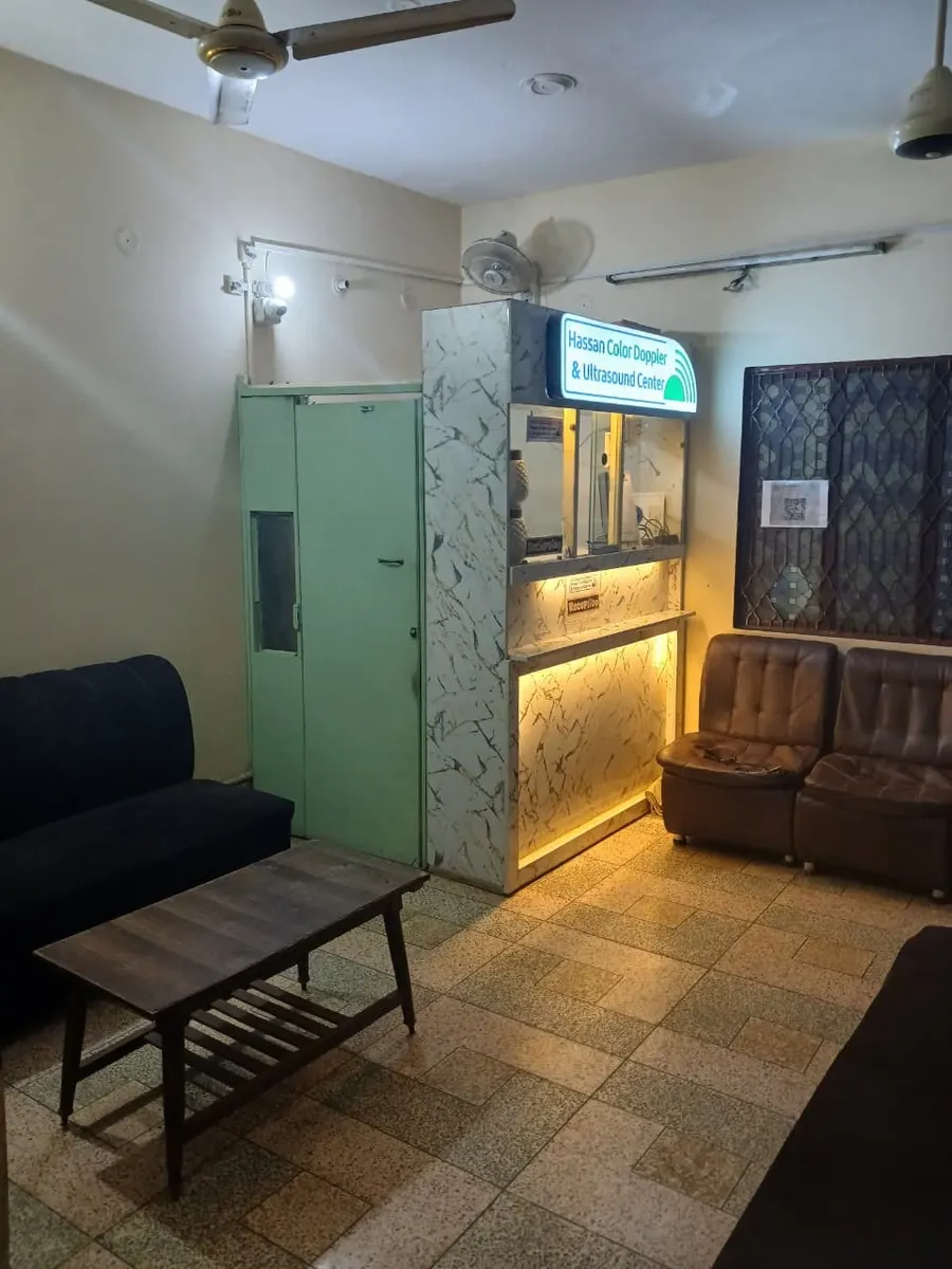 The waiting area and reception desk at the centre in Kahna Nau, Lahore
